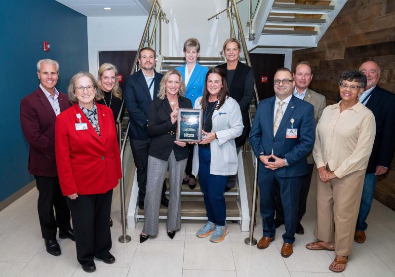 Improving Patient Throughput at Beebe Healthcare award presentation attendees shown are in back (l-r) Mike Meoli, board of directors chair; Mary McLoughlin, quality and safety committee chair; Dr. William Chasanov; senior vice president and chief health systems design officer; Kathy Tregear; senior vice president and chief nursing executive; Loretta Ostroski, vice president of integrated care, continuum of care; and Dr. Paul C. Peet and Matt Lukasiak, quality and safety committee members. In front are Sara Larch, board vice chair; Lisa Knapp, case management director; Jamie Dickerson, patient care services director; Dr. Paul Sierzenski, senior vice president and chief physician executive; and Bonnie Hall, quality and safety committee member. SUBMITTED PHOTOS